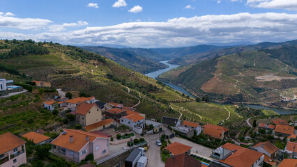 View of the terraced vineyards in the Douro Valley and river near the village of Pinhao, Portugal. Concept for travel in Portugal and most beautiful places in Portugal