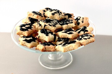 cookies coconut flakes flour and chocolate icing