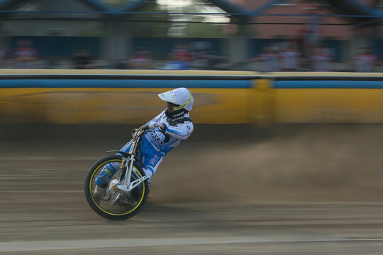 DAUGAVPILS, LATVIA - JUNE 16, 2024: Match of regular championship of Poland. National league of speedway. Lokomotiv (Daugavpils) - Unia (Tarnuw) 44:45. Match in the Daugavpils. Riders on the track