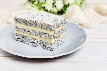 Poppy seed and vanilla layer cake.