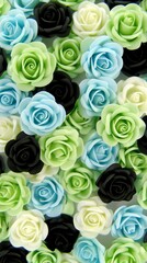 A close-up image of a variety of roses in pastel shades and black