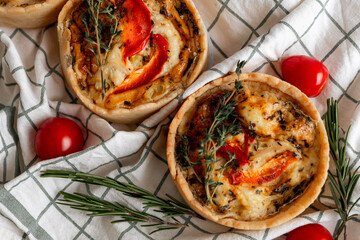 Rustic Tomato and Herb Tart with cherry tomatoes and rosemary, perfect for a veg meal