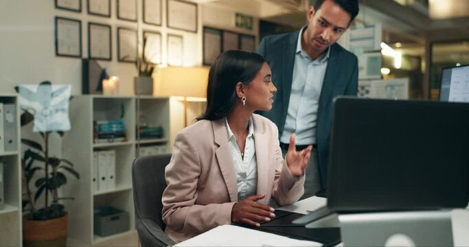 Frustrated, man and woman in office together with stress, deadline pressure and overtime at consulting agency. Teamwork, support and business people at desk at night with crisis, burnout and anxiety