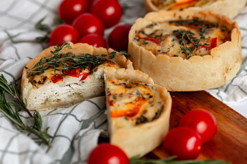 Rustic Tomato and Herb Tart with cherry tomatoes and rosemary, perfect for a veg meal