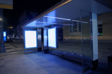 Bus stop on the street of a night city