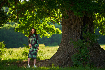 Beautiful Hispanic woman in oak forest