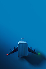 Travel luggage with airplane wings on blue background with copy space. Ready for travel concept design. 3D Rendering, 3D Illustration