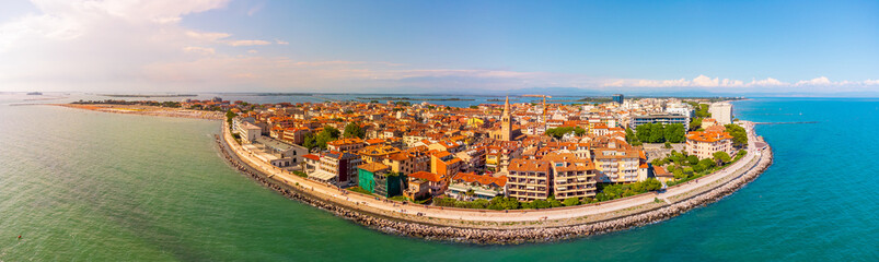Naklejka premium City of Grado, Italy, in summer at sunset
