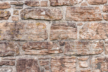 Stone wall at the 13th century ruins of Caerlaverock Castle.