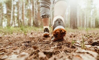 Womens foot steps in the forest 