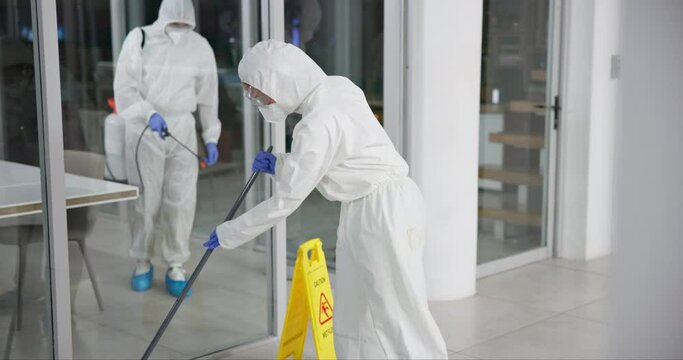 Professional, office and cleaning service and disinfect, mopping and sterilization for health care. Germ, protection and virus with safety suit for chemical exposure, fumigation team and hygiene mask