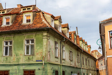 Europe, Romania Brasov. 16th C arcaded, and terra cotta roofed houses and narrow streets.