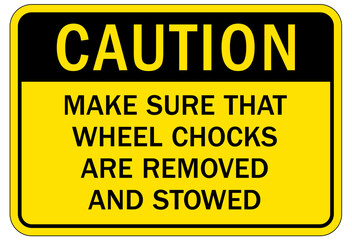 Obraz premium Chock wheels warning sign make sure that wheel chocks are removed and stowed