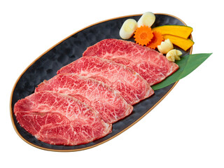 Chuck Eye Sliced is beautifully arranged with a set of vegetables (Slice the pumpkin, garlic, Japanese leeks and carrots) served on a black plate isolated on white background.