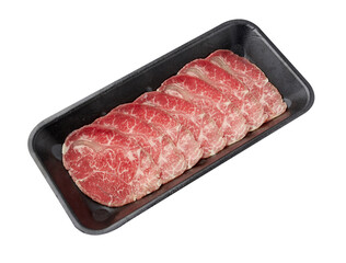 Thinly sliced ​​fresh beef arranged on a black tray isolated on white background.