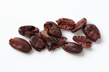 Cocoa beans on white background 