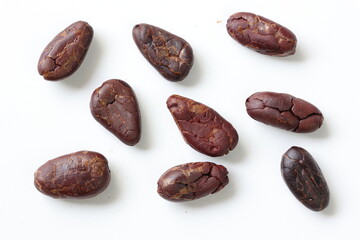 Cocoa beans isolated on white