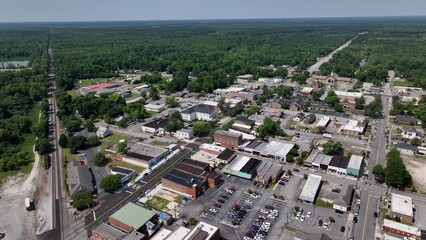 Obraz premium Historic Kingstree, South Carolina downtown buildings, architecture, streets, business, homes in small town USA in the South with shade trees by Black River on Sunny afternoon in summer