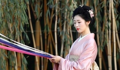   Qixi or Chilseok. A young beautiful Chinese woman in a pink kimono on a background of bamboo and Tanabata ribbons