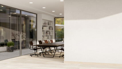 The interior design of a contemporary meeting room corridor features an empty white wall.