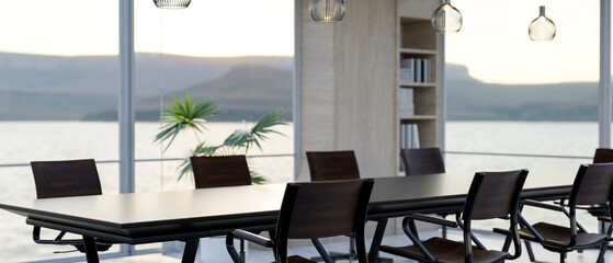 A modern meeting room features a black meeting table and a nature view through the large window.