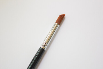 
Acrylic brush on a white background.
