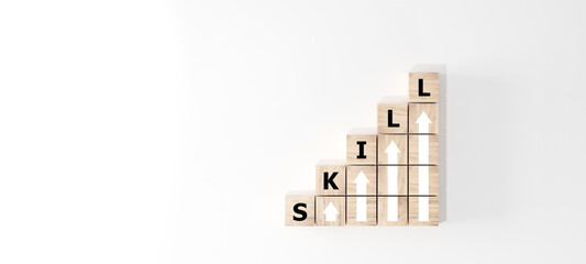 skills icon on wooden cube. Upskilling and personal development concept. Skill training, education,...