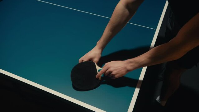 Top view of Table Tennis Players in a dark room