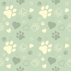 Seamless pattern with paw prints and hearts on a green background © Wirestock