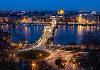 Night view of the Chain Bridge and St. Stephen's Basilica in Budapest, Hungary