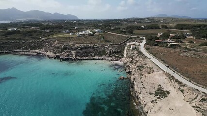 Drone fly above Favignana island coastline Aegadian Islands  aerial high angle view of Mediterranean Sea 