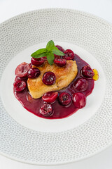 duck with cherry sauce and mint