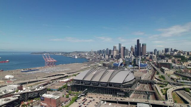 Seattle skyline with Seahawks and Mariners sports stadiums in foreground, 4K