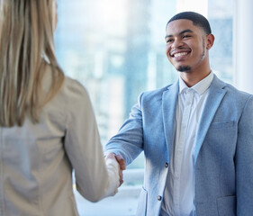 Fototapeta premium Handshake, meeting and business people in office for partnership, collaboration and onboarding. Corporate, teamwork and man and woman shaking hands for agreement, recruitment and interview success
