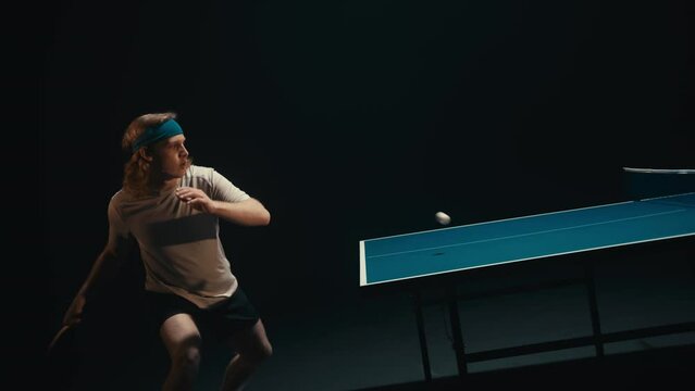 Long blond hair player in a ping pong match