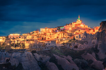 Night scene of Uchisar Castle in Cappadocia. Majestic summer view of famous Uchisar village,...