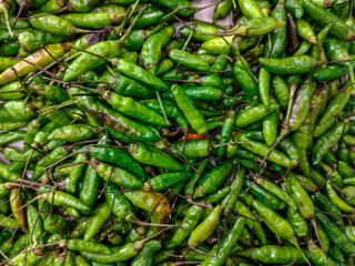 Fresh Green Bird's Eye Chili Peppers at a Local Market