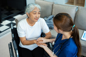 Fototapeta premium Female doctors shake hands with patients encouraging each other To offer love, concern, and encouragement while checking the patient's health. concept of medicine.