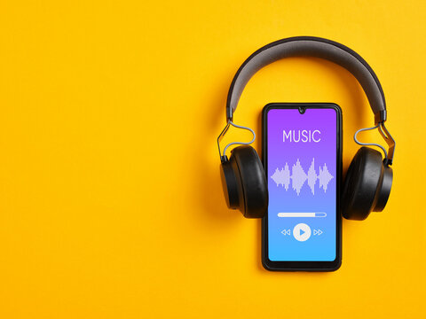 Listening to music with smartphone music player app.