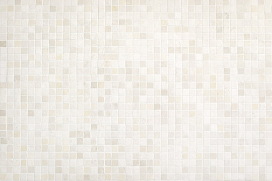 Cream and white ceramic tile floor wall pattern or white ceramic tile background