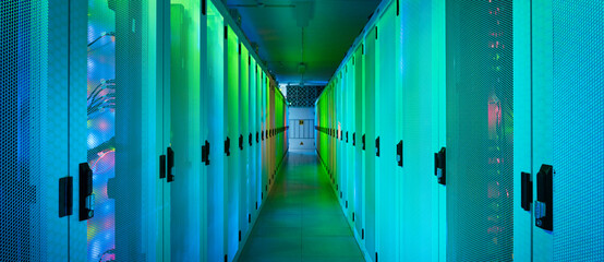 Illuminated colorful network server room of data center
