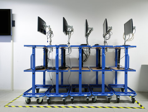 Computer setup on blue cart for examining server room at data center