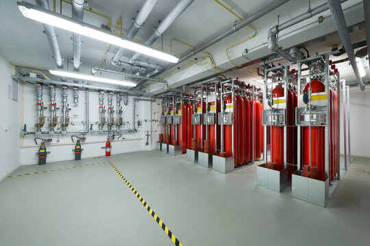 Red large fire extinguishers at data center