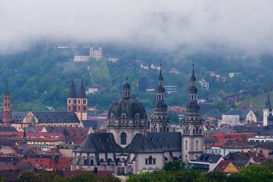 Germany, Bavaria, Wurzburg, Fog floating over Stift Haugchurch