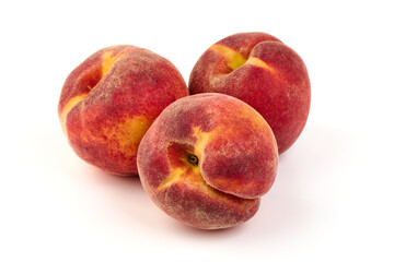 Fresh peaches, isolated on white background.