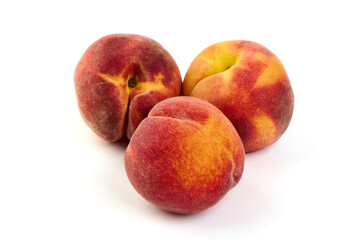 Fresh peaches, isolated on white background.
