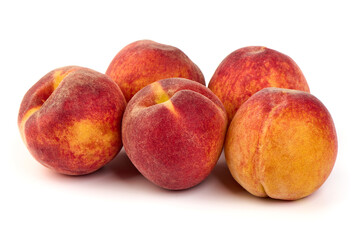 Fresh peaches, isolated on white background.