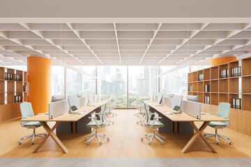 Wooden coworking interior with pc monitors on tables in row, panoramic window