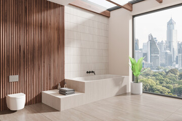 Modern bathroom with a bathtub, wooden panel wall, large window with city view, and potted plant. Light-colored minimalistic interior design. 3D Rendering