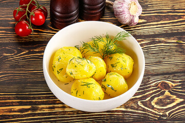 Boiled potato with oil and dill